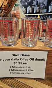 Shot glasses with olive oil dosage instructions.