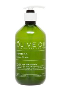 Green bottle of Olive Oil shampoo.