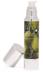 Olive oil facial serum bottle with cap.
