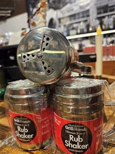 Grill rub shaker containers on display shelf.