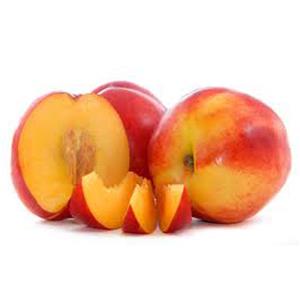 Sliced and whole nectarines on white background.