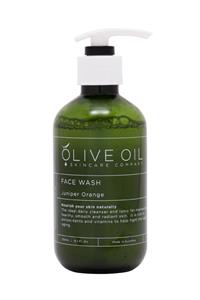 Green bottle of olive oil face wash.