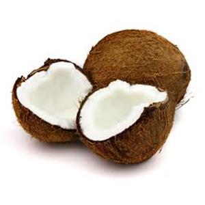 Whole and halved coconuts on white background.